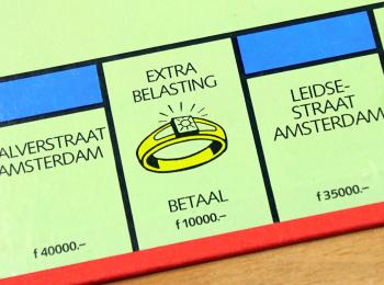 Afbeelding van het vakje 'Extra belasting' op een monopolybord